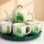 Revolving Floral Porcelain Tea Set – Kettle & Cups for Modern Homes