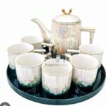 REVOLVING FLORAL PORCELAIN TEA SET-KETTLE & CUPS FOR MODERN HOMES