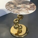 Luxury & Elegant Auric Marble Top Pedestal Side Table – Modern Sculptural Gold Sphere Base End Table for Luxury Interiors.