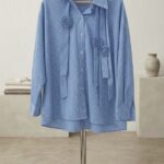 Women’s Premium Blue & White Striped Oversized Shirt featuring Hand-Crafted Rosette Embellishments and Classic Collar.